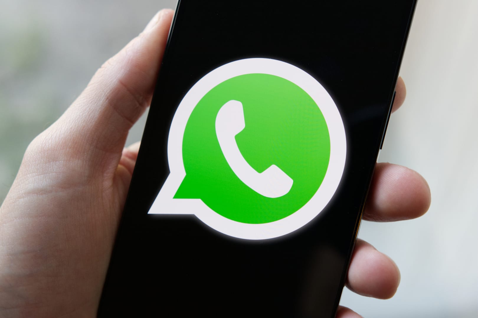 whatsapp logo phone close 1